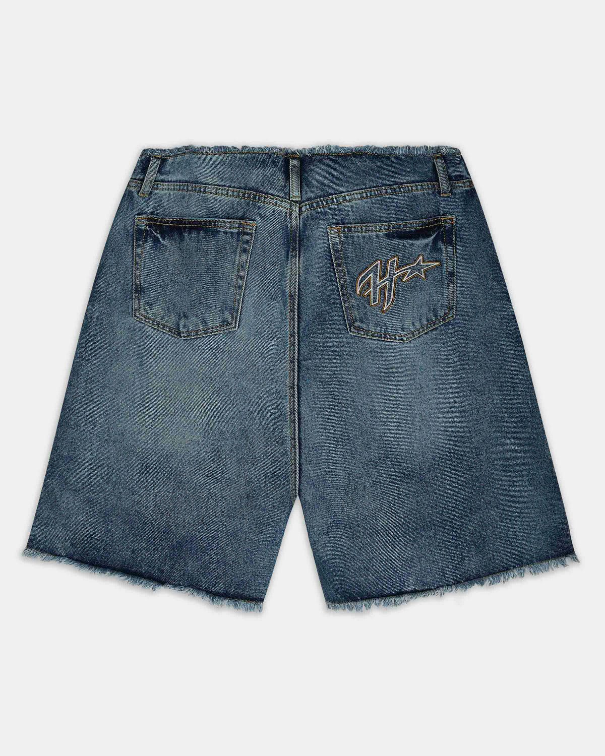 Back view of blue denim shorts with a raw frayed hem, featuring a gold embroidered logo on the right pocket.