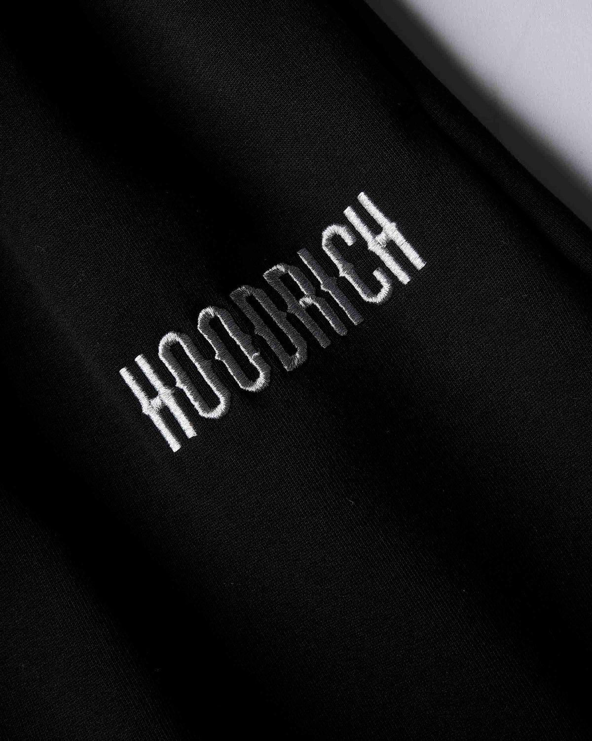Displays the Black 'Hoodrich' branded women's Solace Full Tracksuit featuring the hoodrich branding