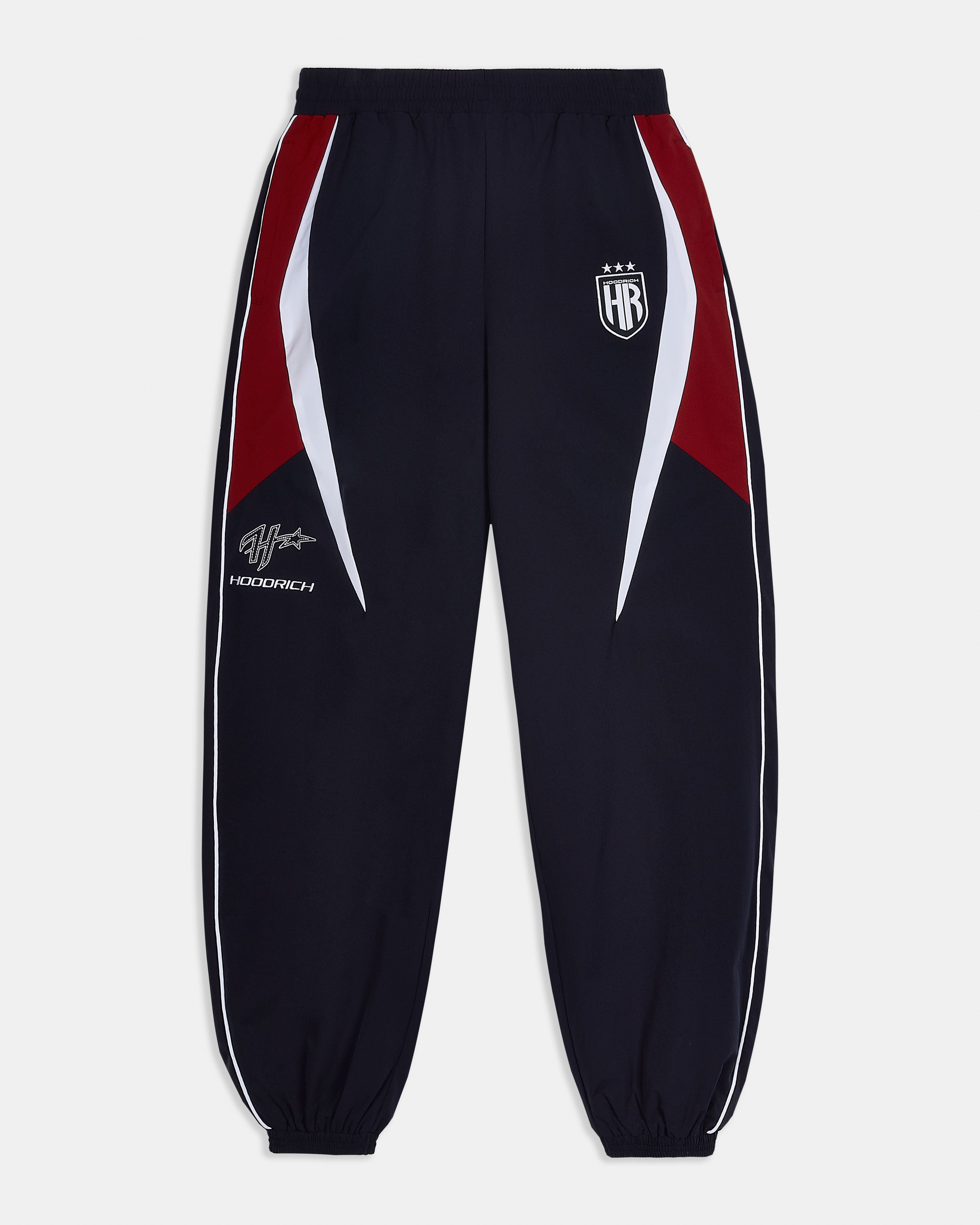 Black tracksuit pants with red and white accents on a white background