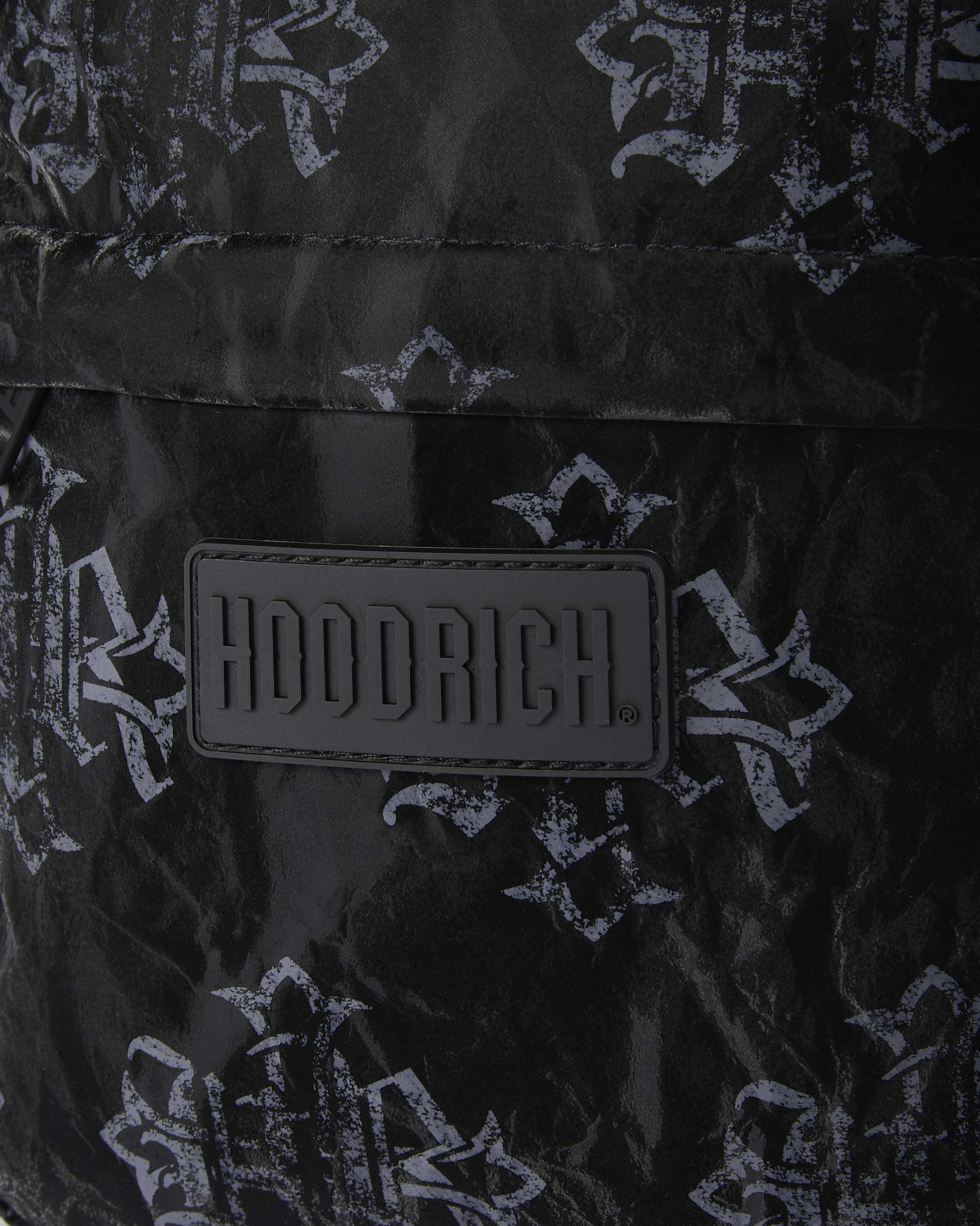 Black bag with white floral patterns and Adderich logo