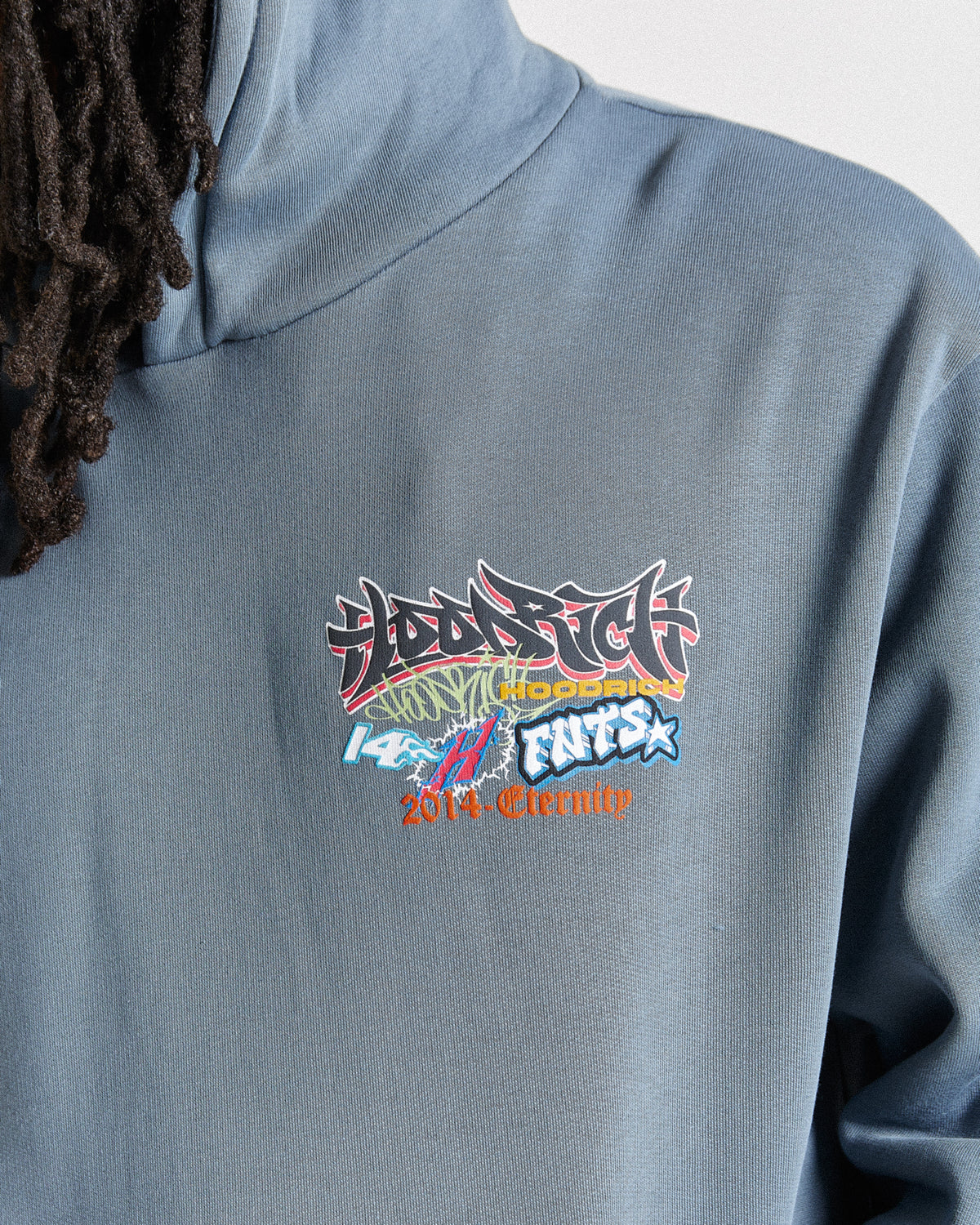 Displays a model wearing the Grey 'Hoodrich' branded men's Graff Rave Full Tracksuit featuring the hoodrich branding details