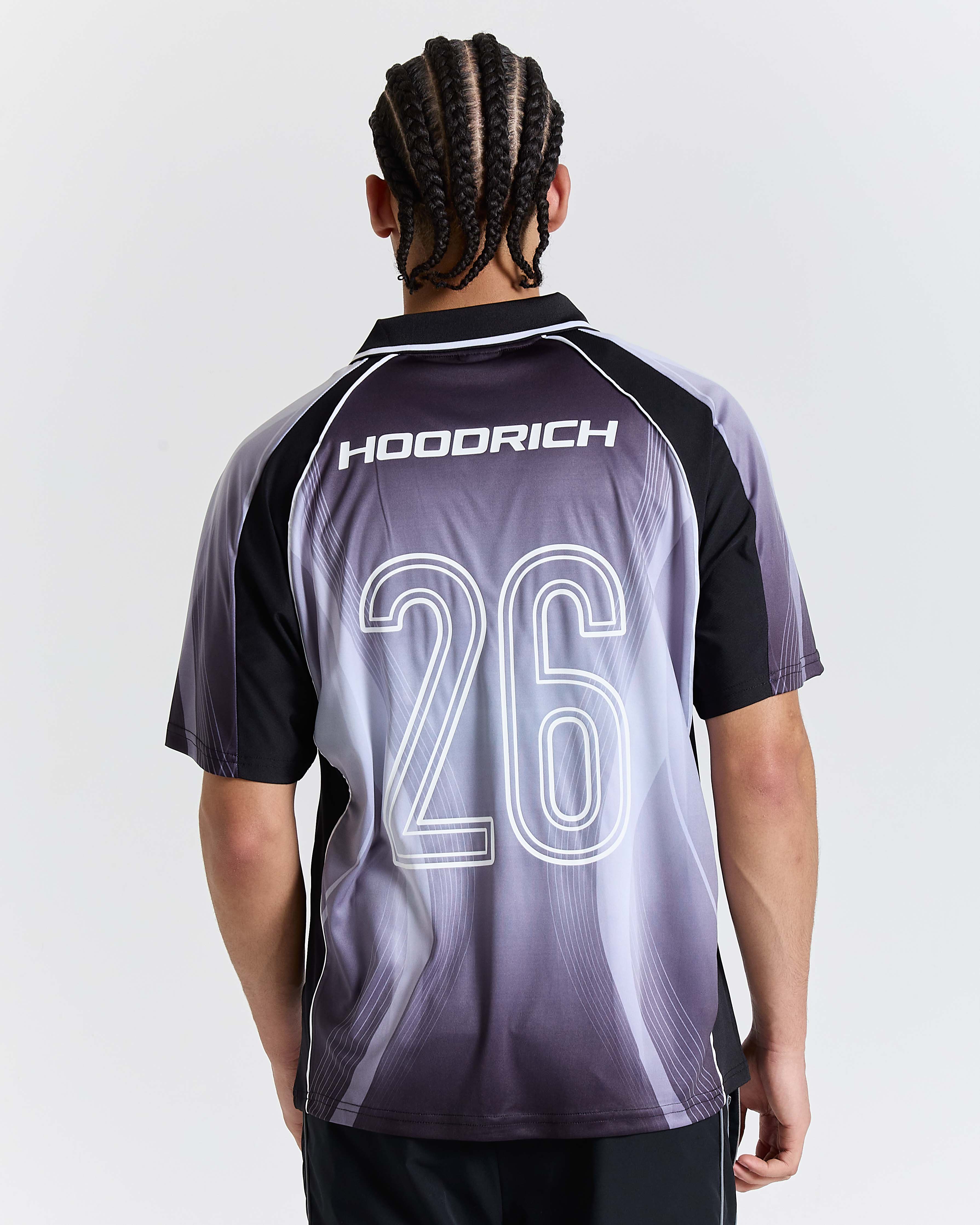 Person wearing a sports jersey with 'Hoodrich' branding and number 26 on the back.