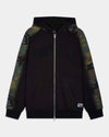 A black zip-up hoodie with camouflage patterned raglan sleeves and a tonal black 'HOODRICH' logo across the chest, displayed on a light gray background.