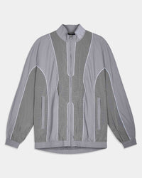 A gray zip-up jacket with a subtle grid pattern on the sleeves and front panels, featuring white piping details and a high collar, shown against a light gray background.