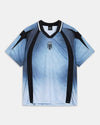 A short-sleeve athletic jersey with a light blue to white gradient body, black shoulder panels, and black vertical side stripes, featuring a black and white V-neck collar and a central crest with the letters HR.