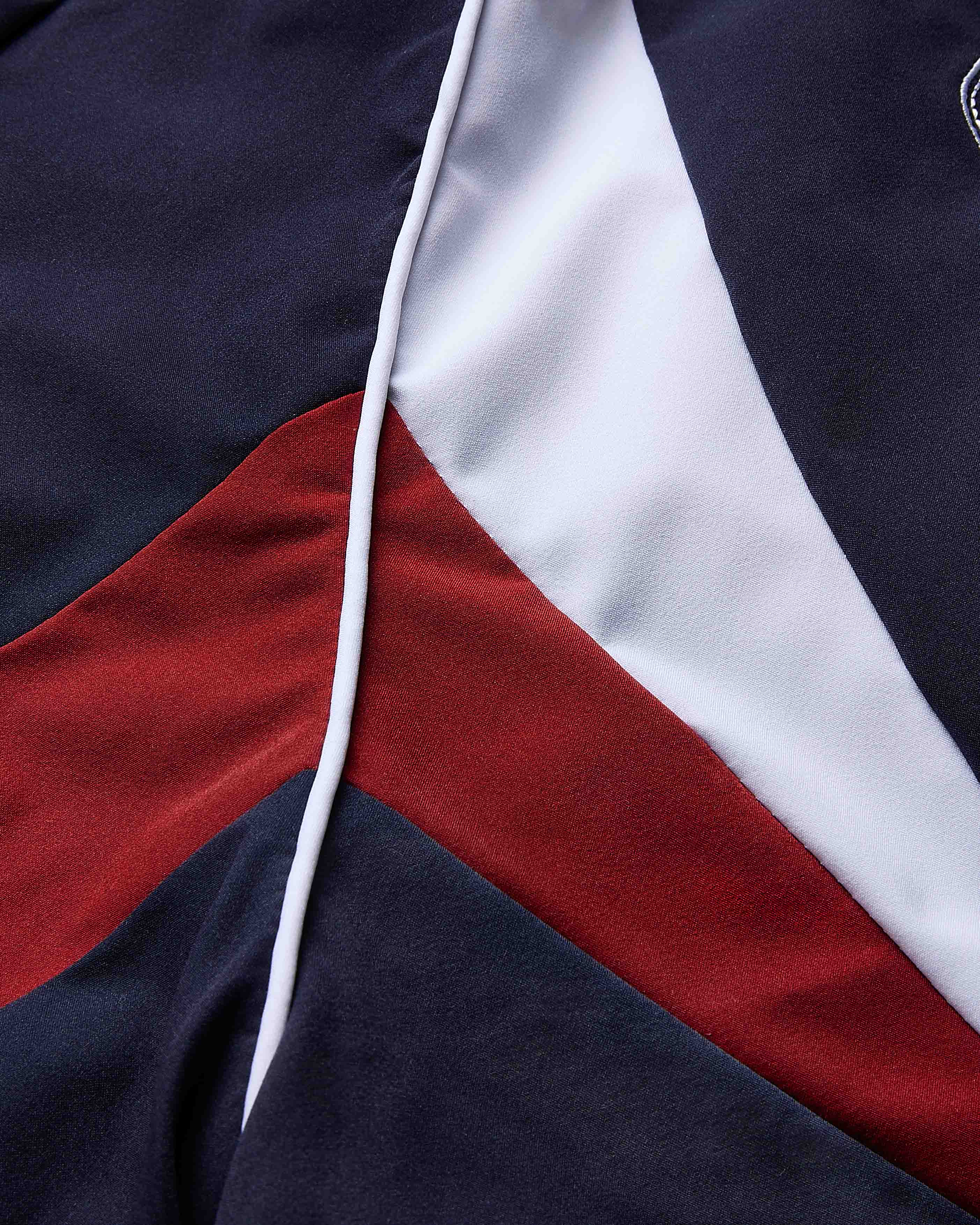 Close-up of a fabric with red, white, and blue colors.