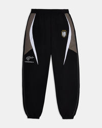 Black tracksuit pants with white and gray accents on a light gray background