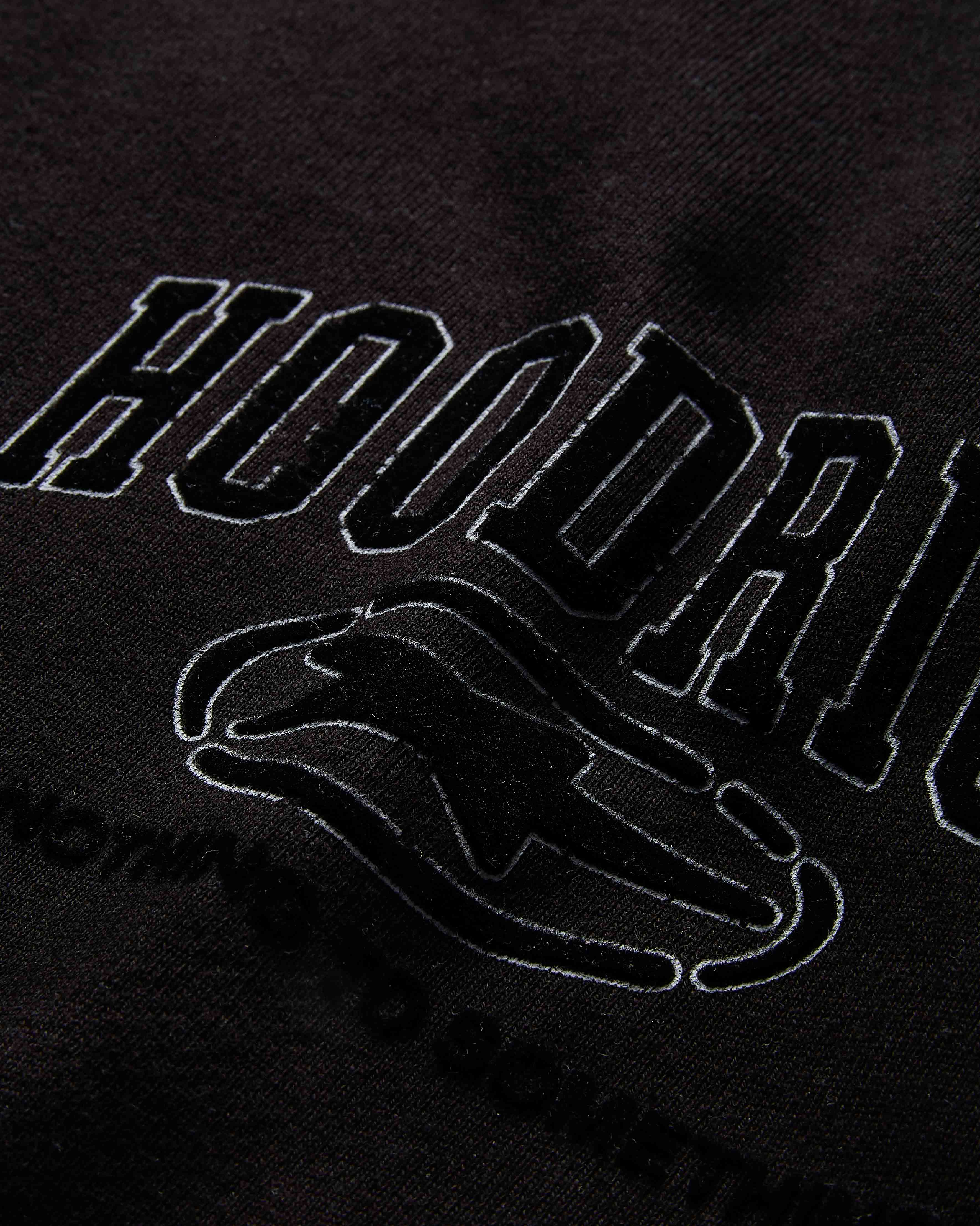 Black hoodie with 'Hoodrat' text and hand graphic on a black background