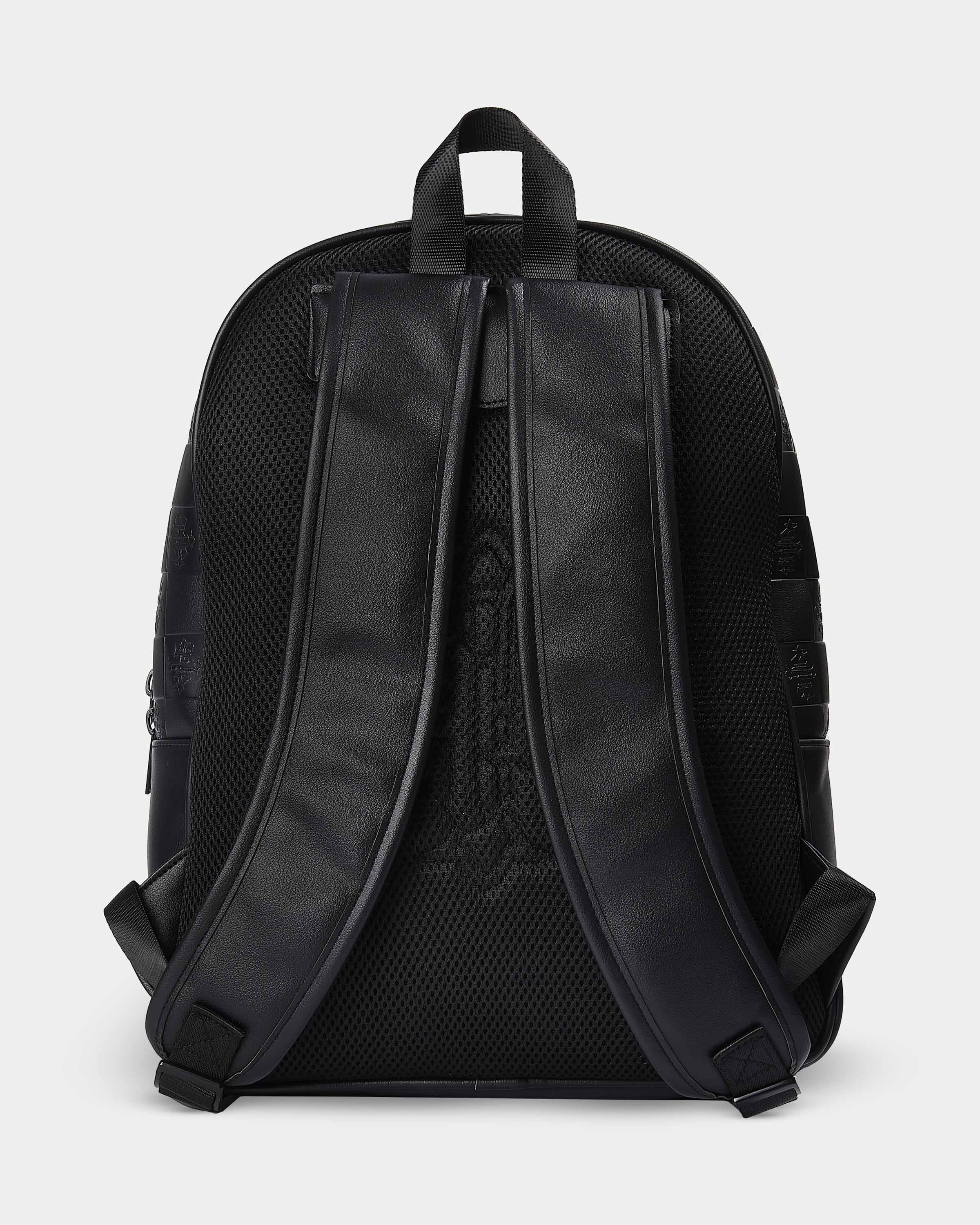 Black backpack on a light gray background