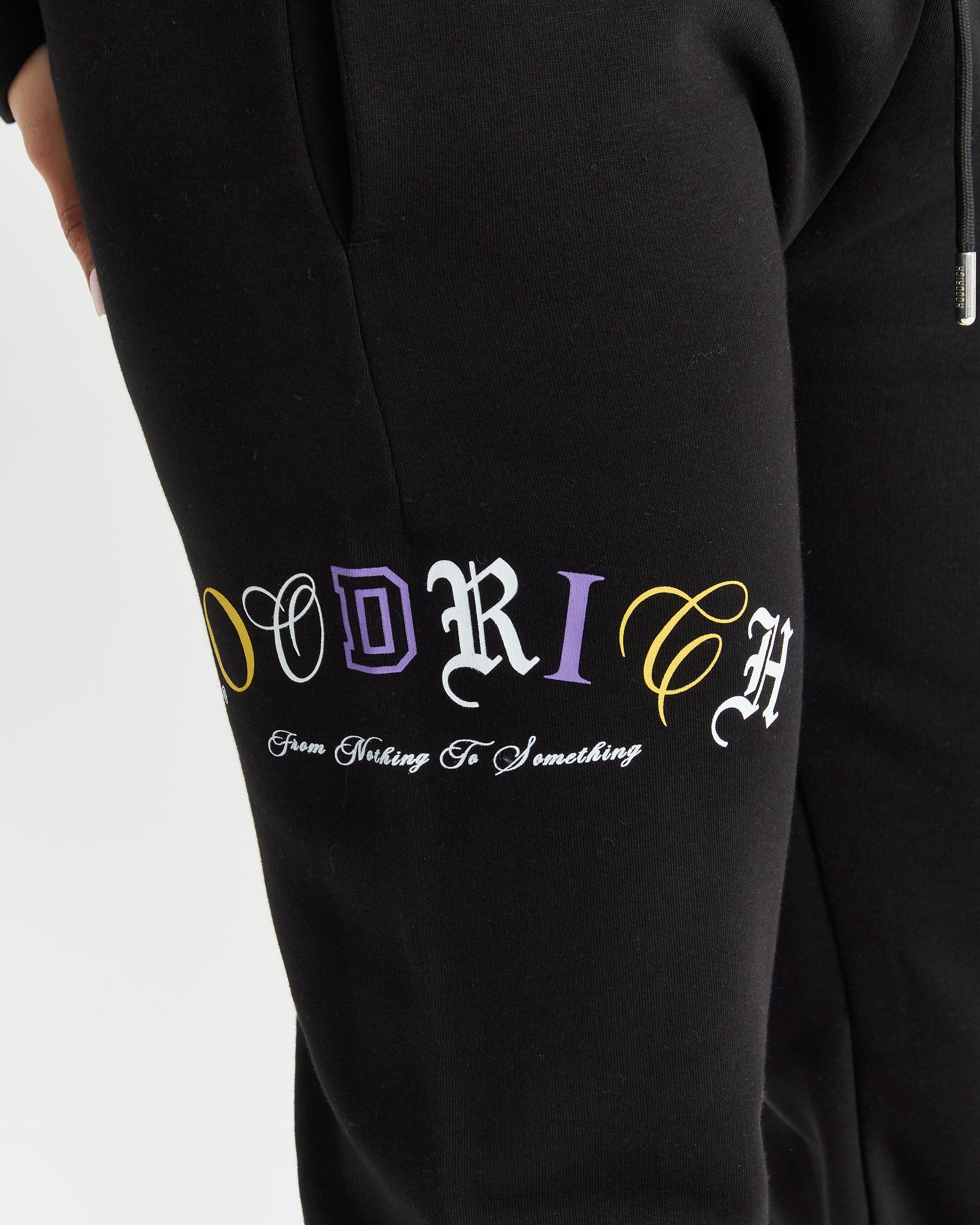 Calor Joggers - Black/White/Yellow/Purple