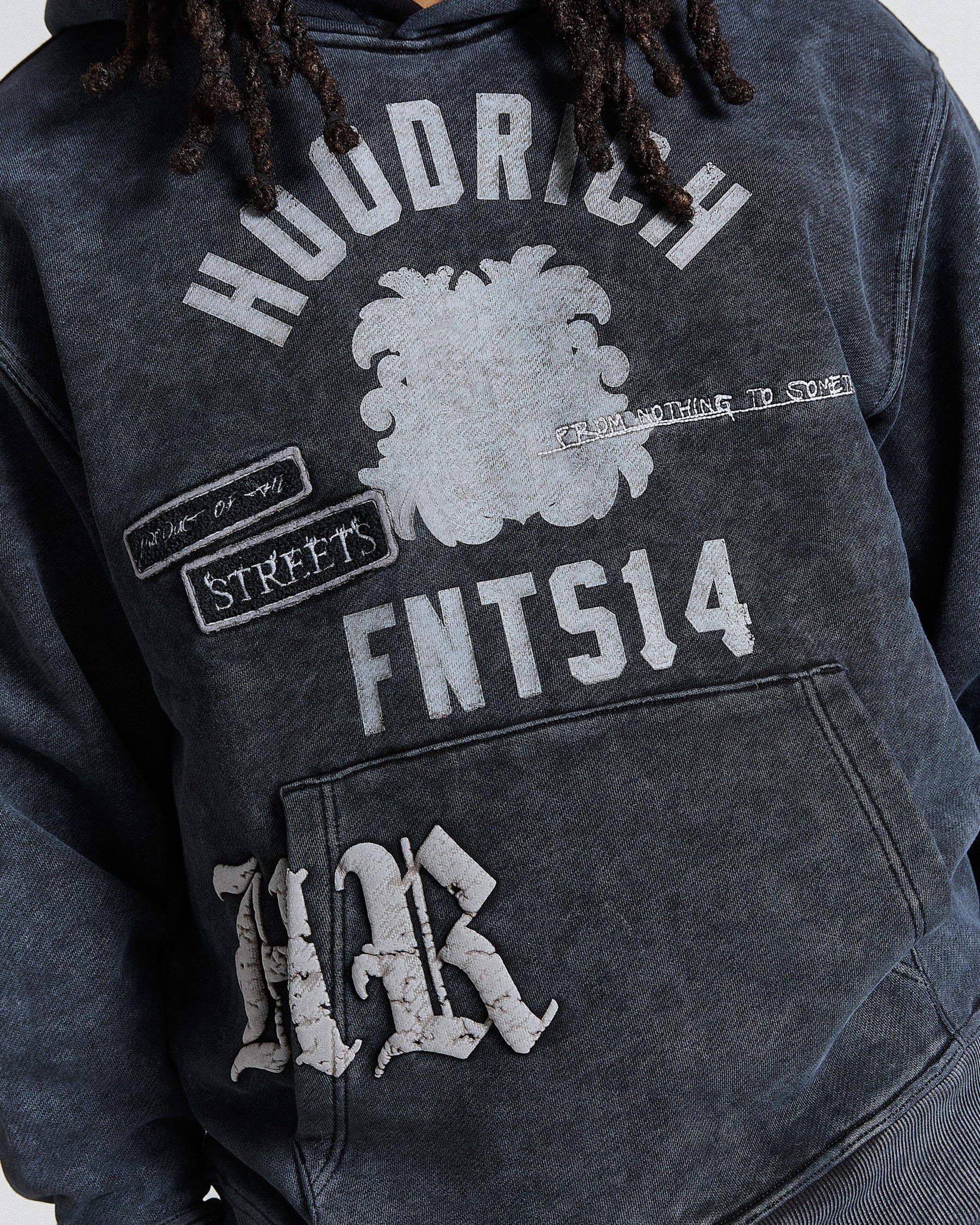 Gray hoodie with text and logo design on a gray background