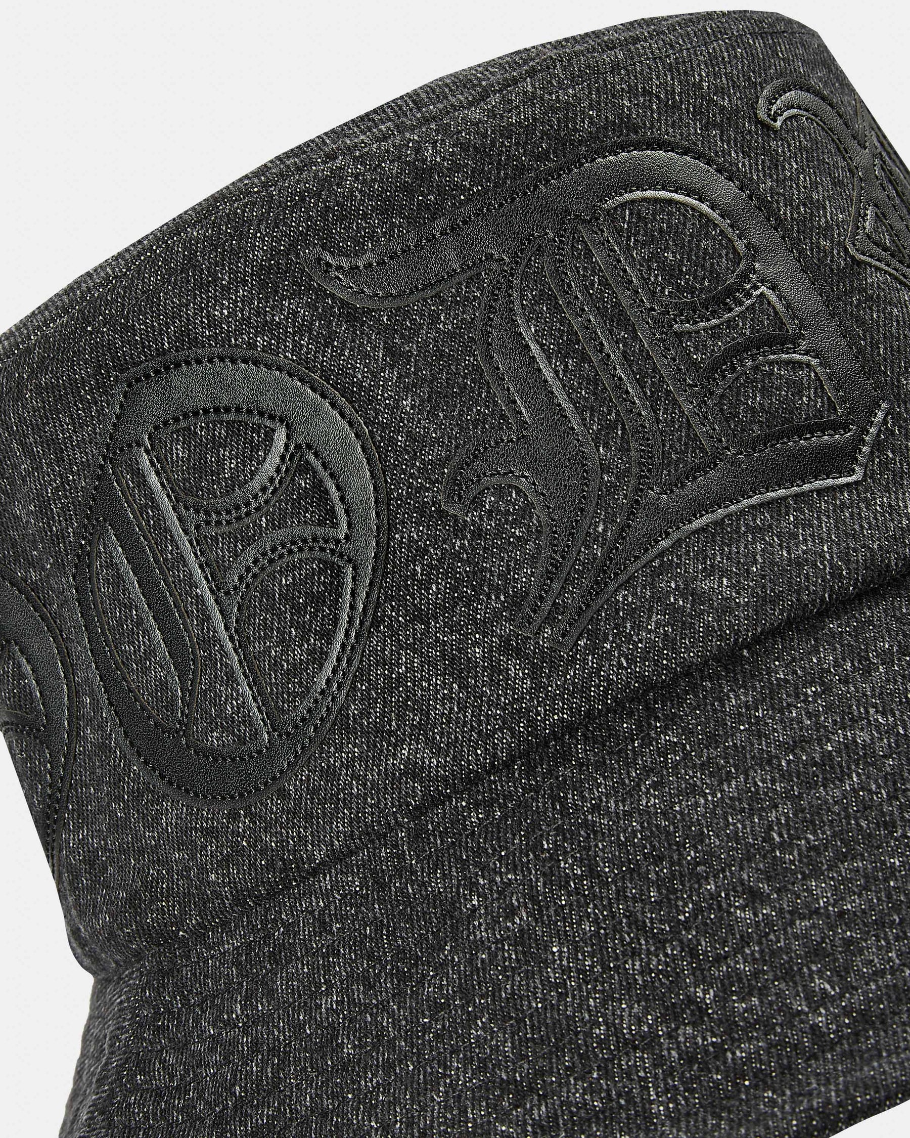 Denim bucket hat with applique PU logo saying 'Hoodrich'